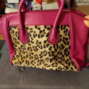 Flushable pink with on front animal print purse